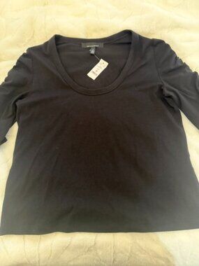 NWT White House Black Market Size Medium. Color Black.  Scoop neck.